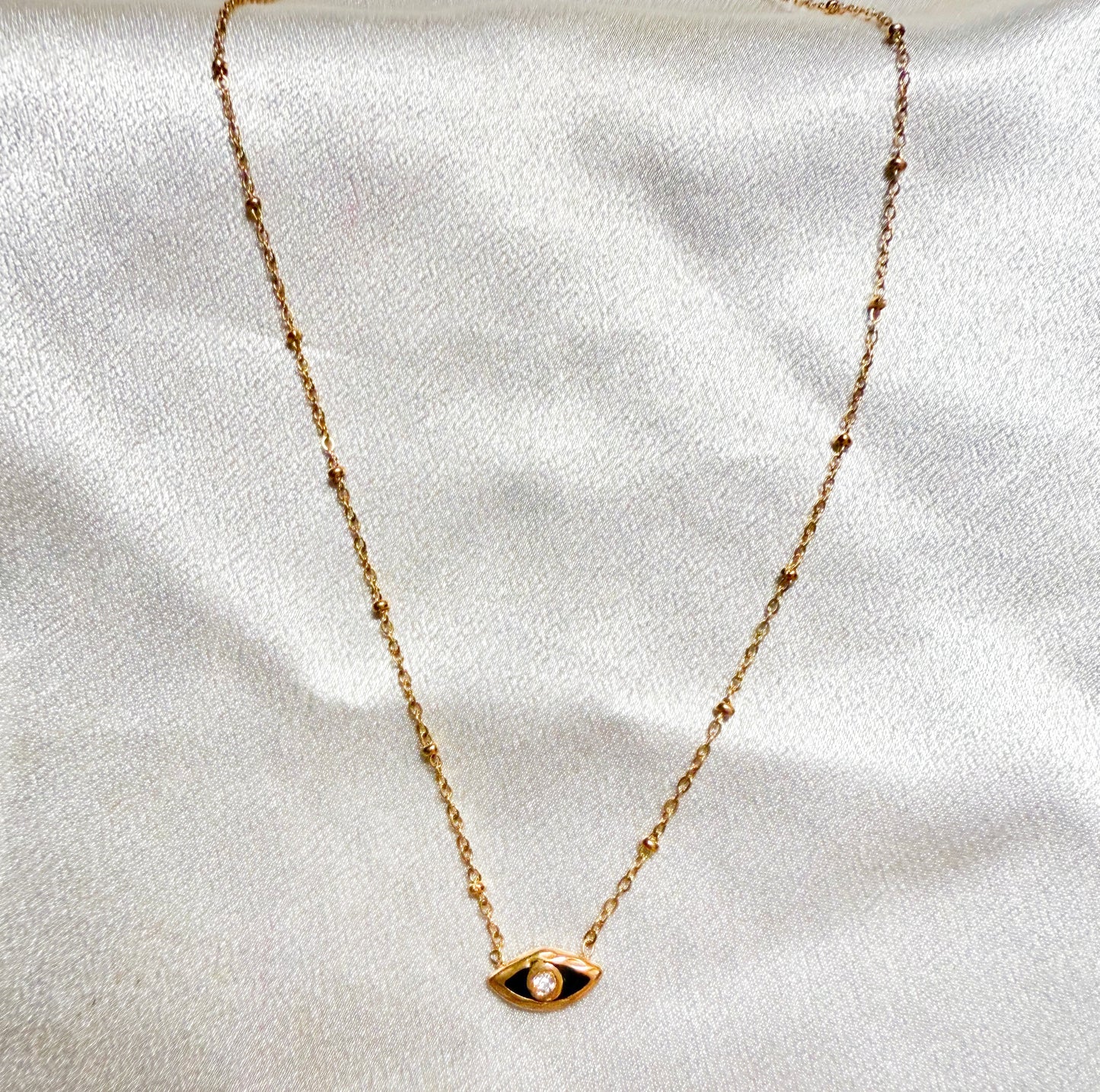 Black eye gold chain beaded necklace