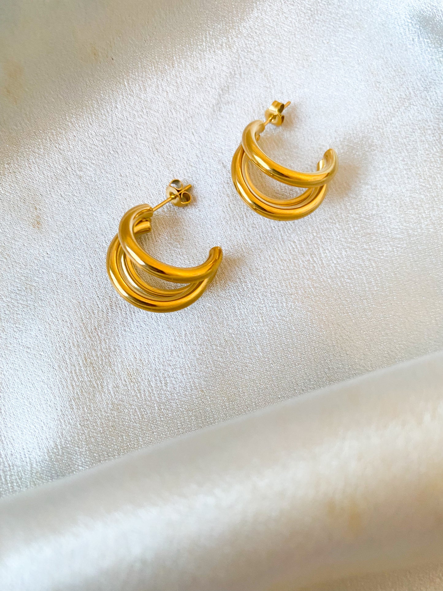 Triple gold hoops