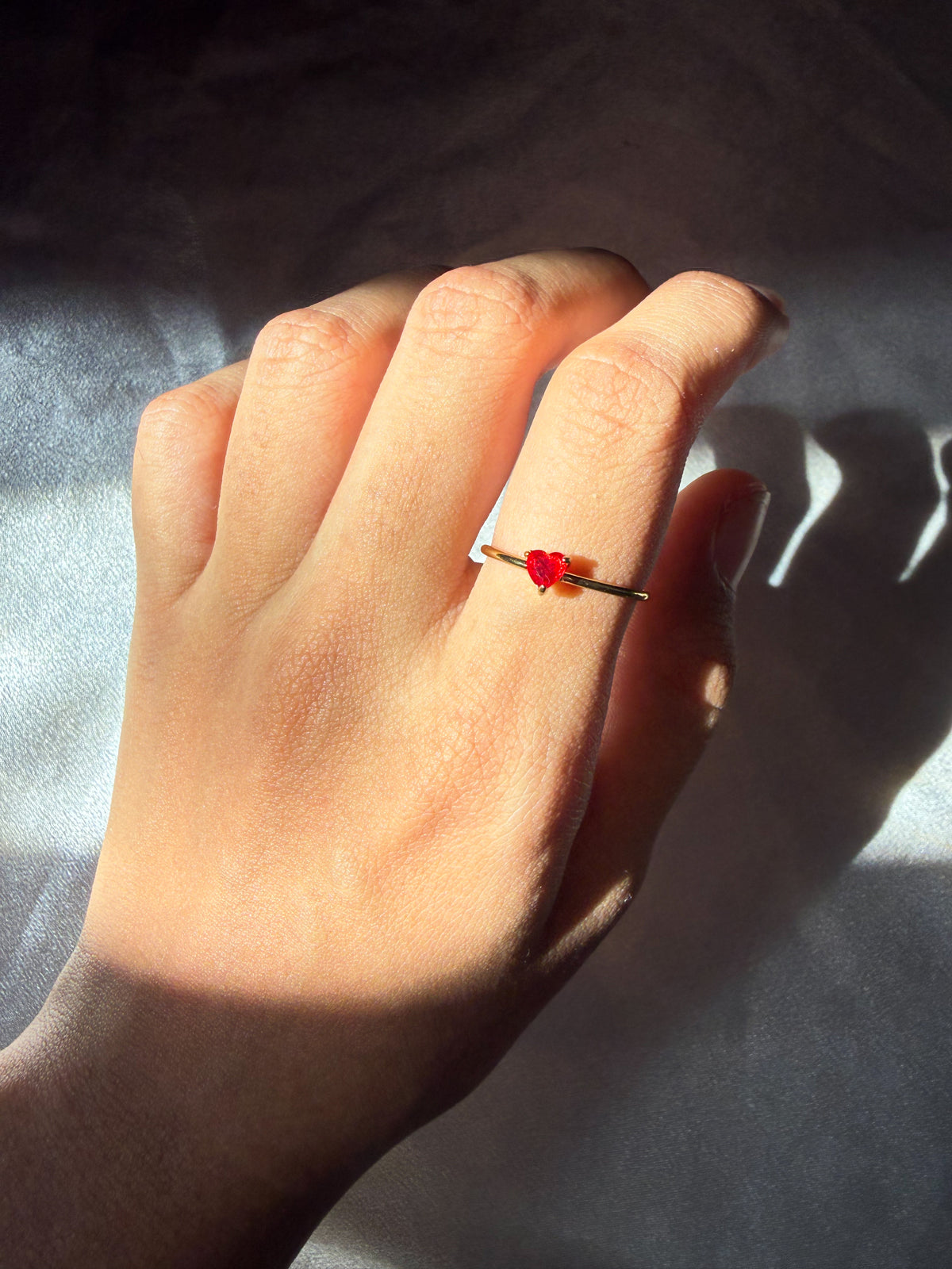 Red heart gold ring