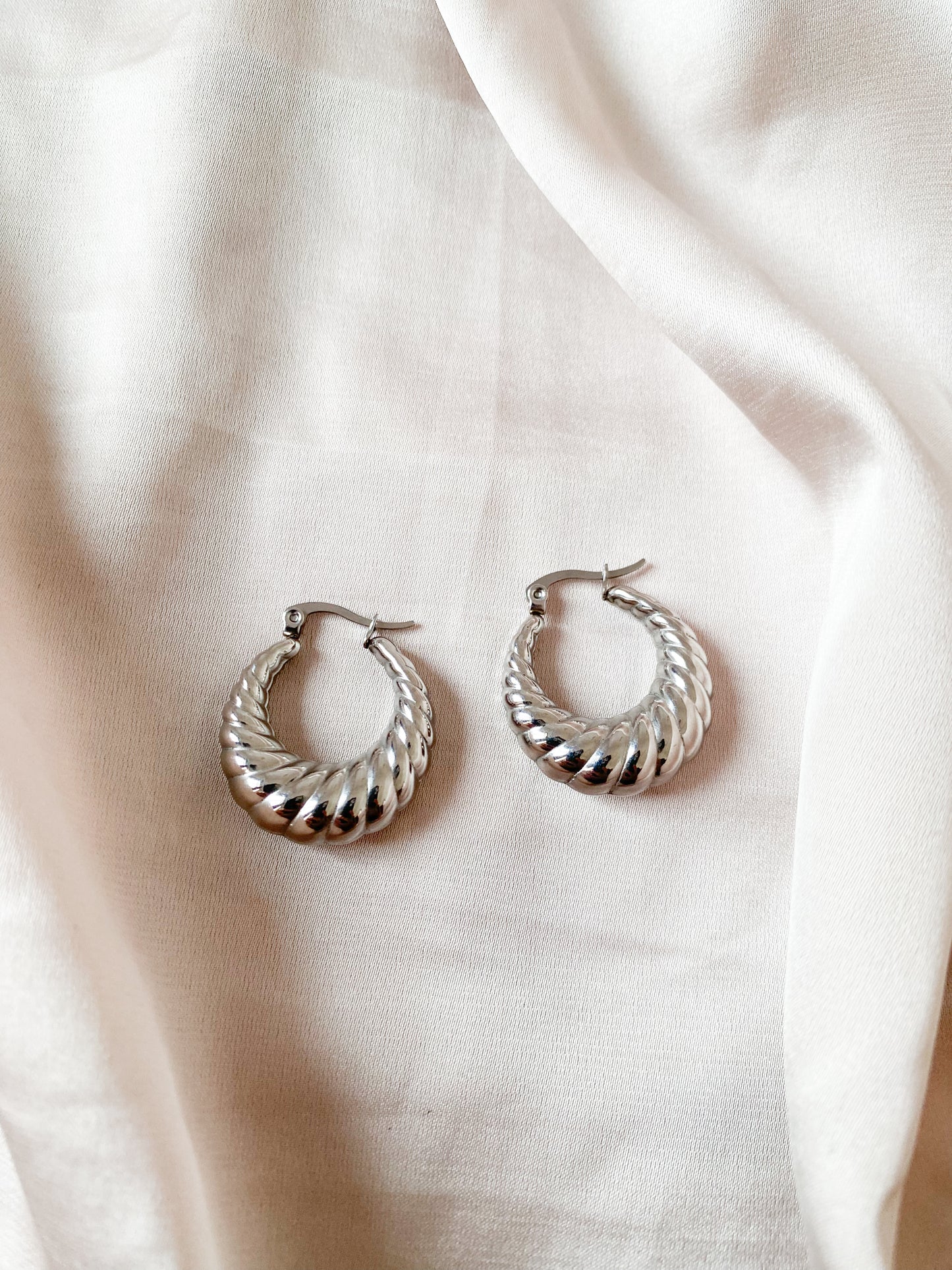 Silver croissant hoops