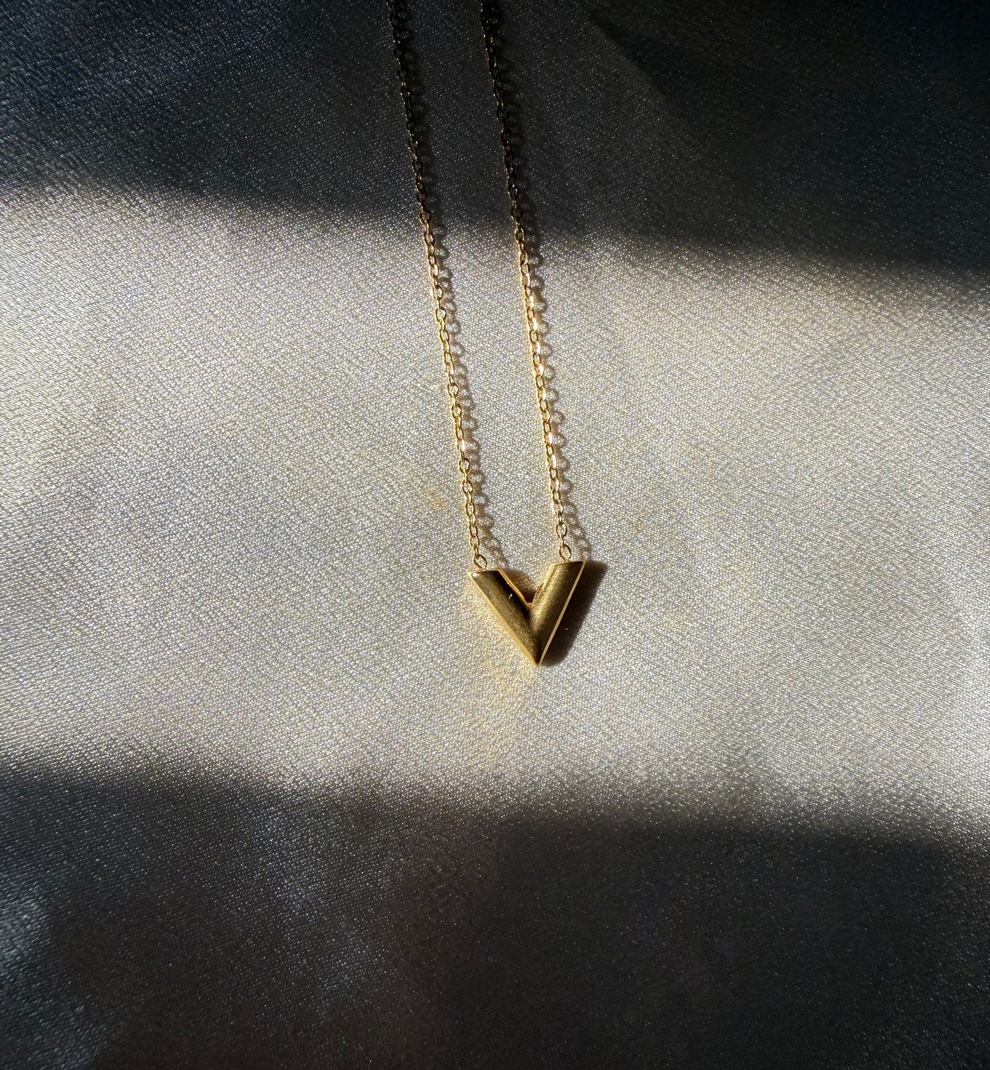 V gold necklace