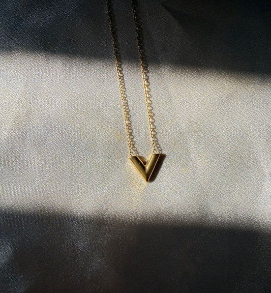 V gold necklace